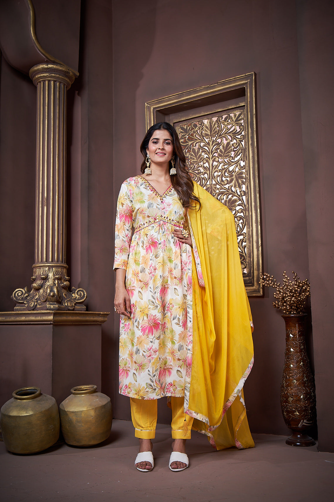 yellow floral printed rayon alia cut salwar suit