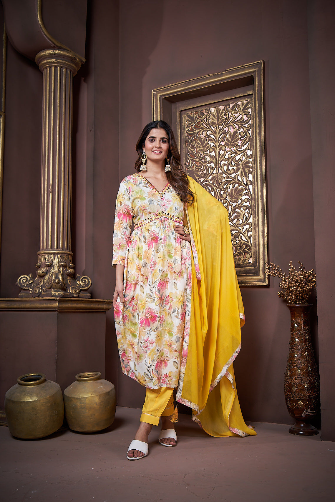 yellow floral printed rayon alia cut salwar suit